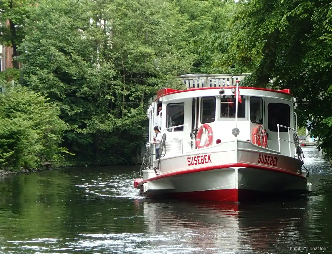 Villas along the Alster canals seen from a Hamburg boat cruise