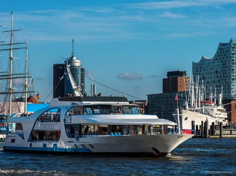 Ship cruising toward Blankenese on a Hamburg harbor sightseeing cruise