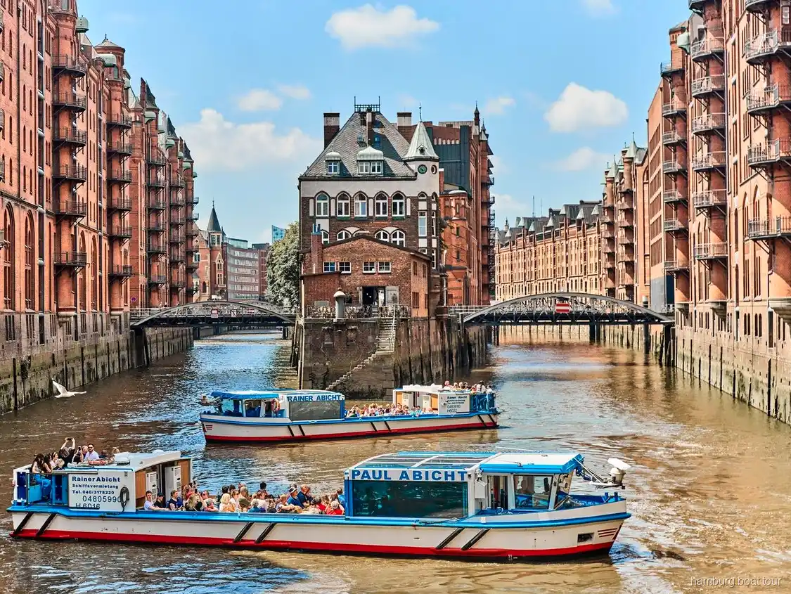 View of the Speicherstadt warehouse canals from a Hamburg harbor cruise boat