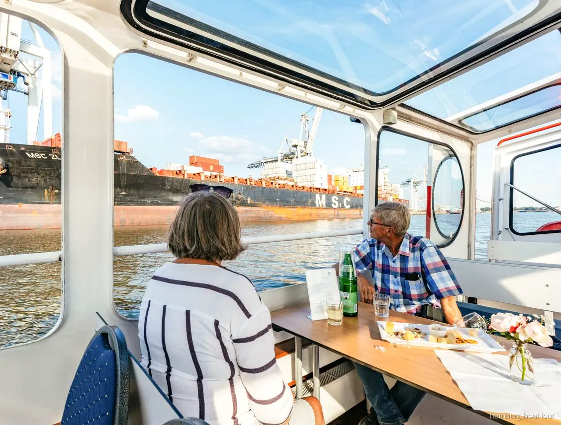 Heated indoor salon on the Hamburg harbor wine and cheese cruise boat