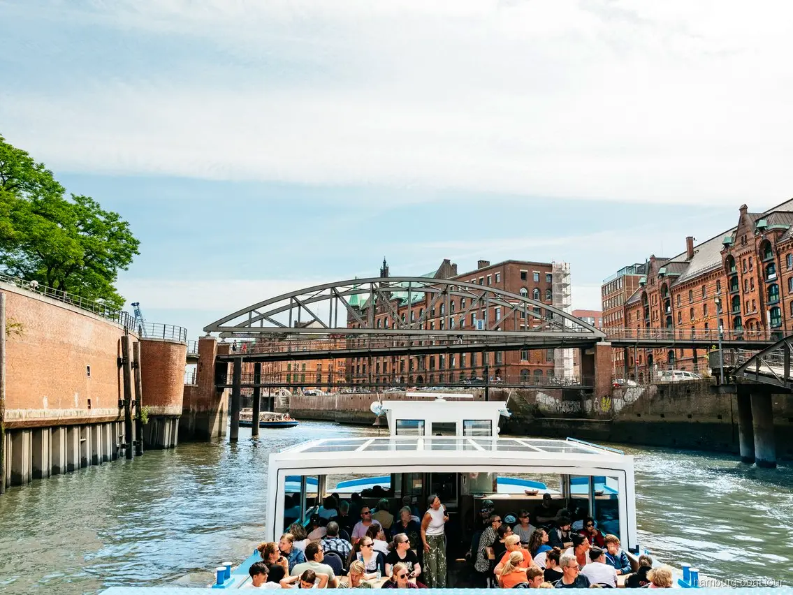 Ship passing through the Port of Hamburg's locks on the XXL port cruise